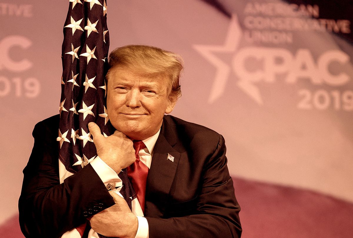 U.S. President Donald Trump hugs the U.S. flag during CPAC 2019 on March 02, 2019 in National Harbor, Maryland. The American Conservative Union hosts the annual Conservative Political Action Conference to discuss conservative agenda.  (Tasos Katopodis/Getty Images)