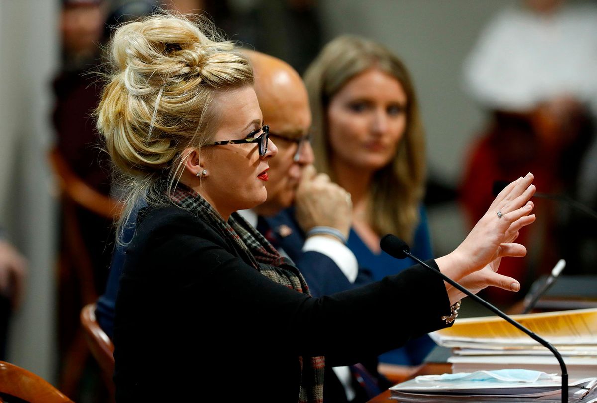 Melissa Carone, who was working for Dominion Voting Services, speaks in front of the Michigan House Oversight Committee in Lansing, Michigan on December 2, 2020. - The president's attorneys, led by Rudy Giuliani, have made numerous allegations of election fraud. (JEFF KOWALSKY/AFP via Getty Images)