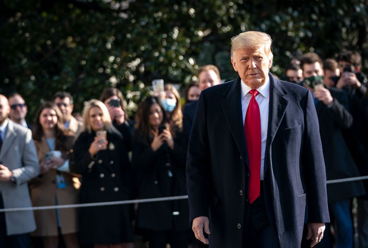 U.S. President Donald Trump turns to reporters as he exits the White House to walk toward Marine One on the South Lawn on January 12, 2021 in Washington, DC. (Drew Angerer/Getty Images)