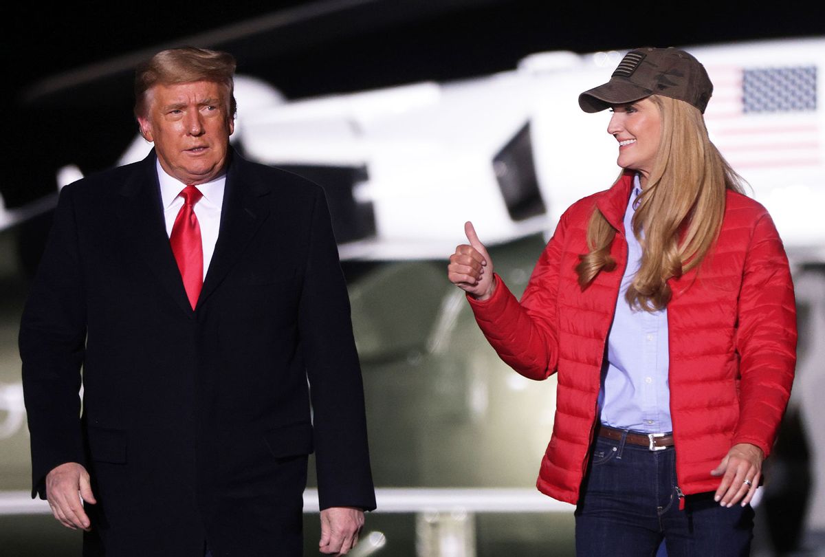 U.S. President Donald Trump arrives with Sen. Kelly Loeffler (R-GA) at a campaign rally at Dalton Regional Airport January 4, 2021 in Dalton, Georgia. Trump campaigned for Loeffler and Sen. David Perdue (R-GA) ahead of tomorrow’s run-off elections in Georgia. (Alex Wong/Getty Images)