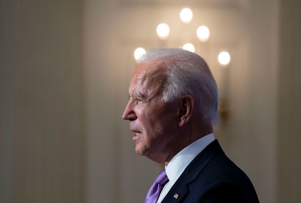 U.S. President Joe Biden speaks about the coronavirus pandemic in the State Dining Room of the White House on January 26, 2021 in Washington, DC. (Doug Mills-Pool/Getty Images)