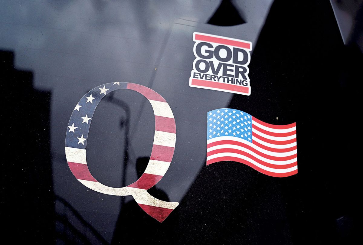 A QAnon sticker is seen on the back of a car on November 6, 2020 in Los Angeles as the entire nation awaits the result of the presidential election. (ROBYN BECK/AFP via Getty Images)