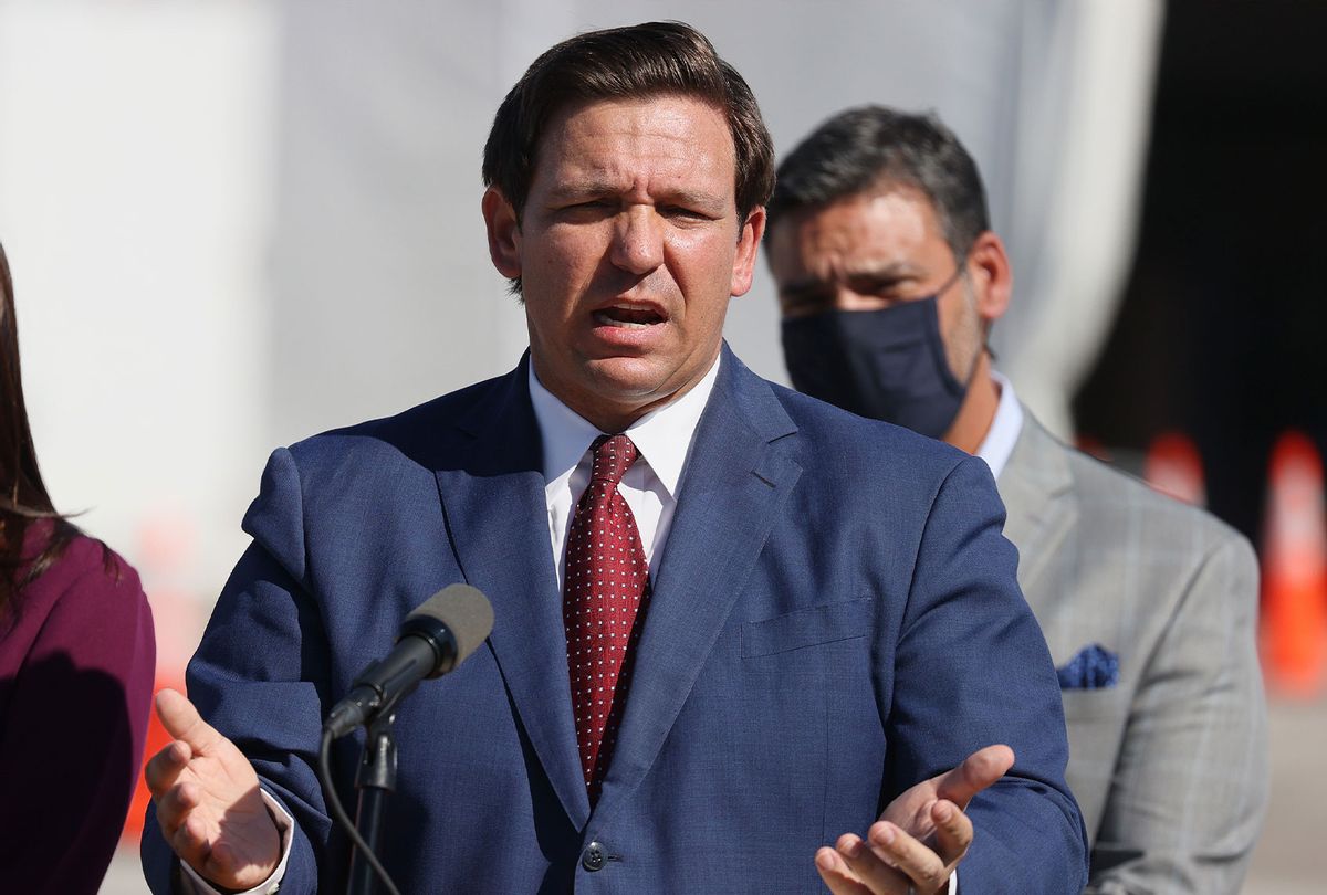 Florida Governor Ron DeSantis speaks during a press conference about the opening of a COVID-19 vaccination site at the Hard Rock Stadium on January 06, 2021 in Miami Gardens, Florida. The governor announced that the stadium's parking lot which offers COVID-19 tests will begin to offer COVID-19 vaccinations for residents 65 and older to drive up and get vaccinated. The vaccination site opened today for a trial run but it was not known when it will be open to the general public. (Joe Raedle/Getty Images)
