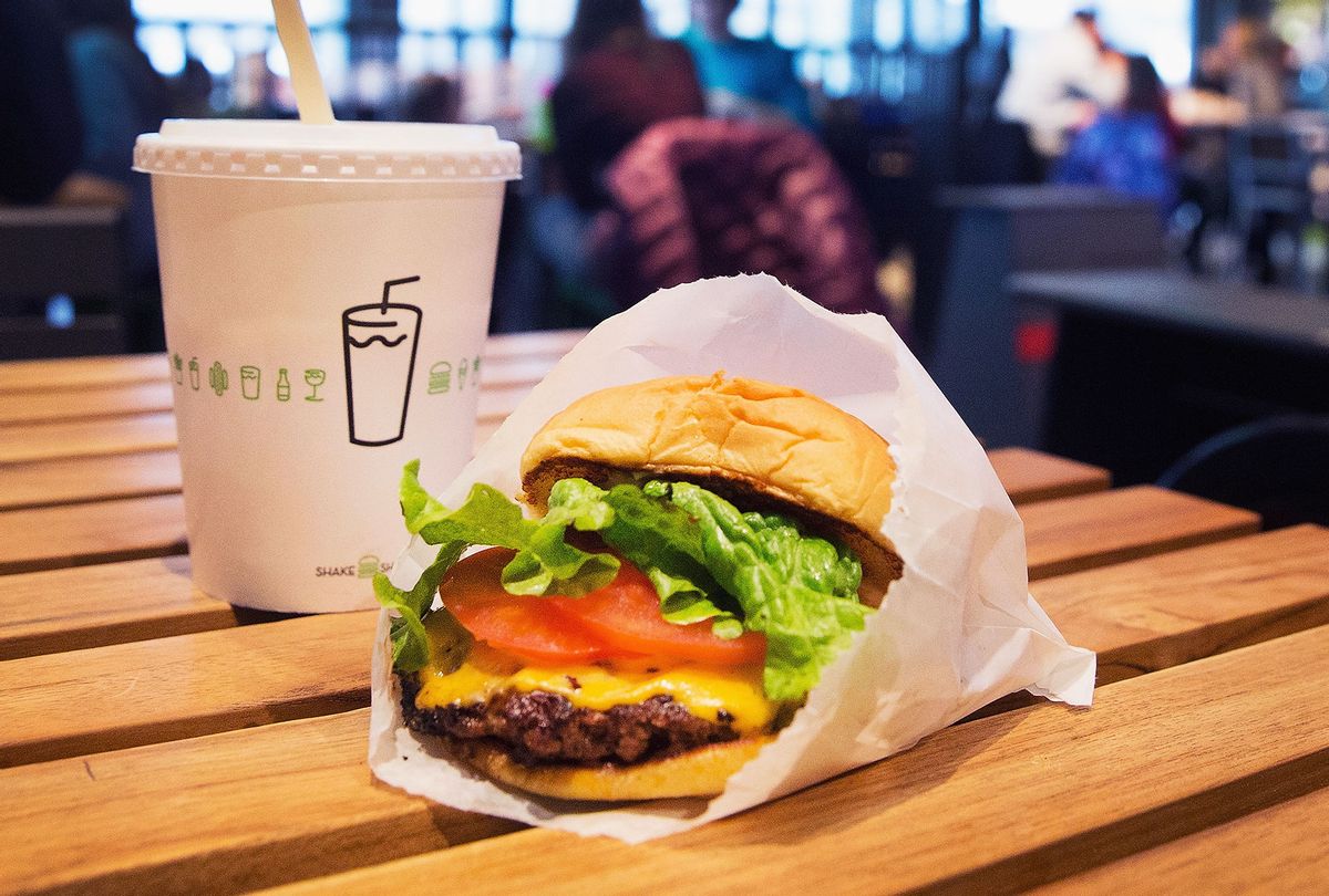 In this photo illustration, a cheeseburger and drink is served up at a Shake Shack restaurant (Scott Olson/Getty Images)