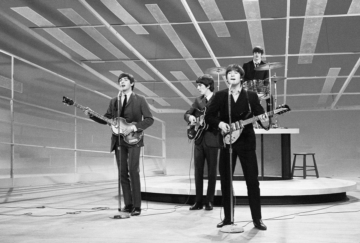 John Lennon Paul McCartney George Harrison and Ringo Starr rehearse their appearance on the Ed Sullivan show. February 1964. (Staff/Mirrorpix/Getty Images)