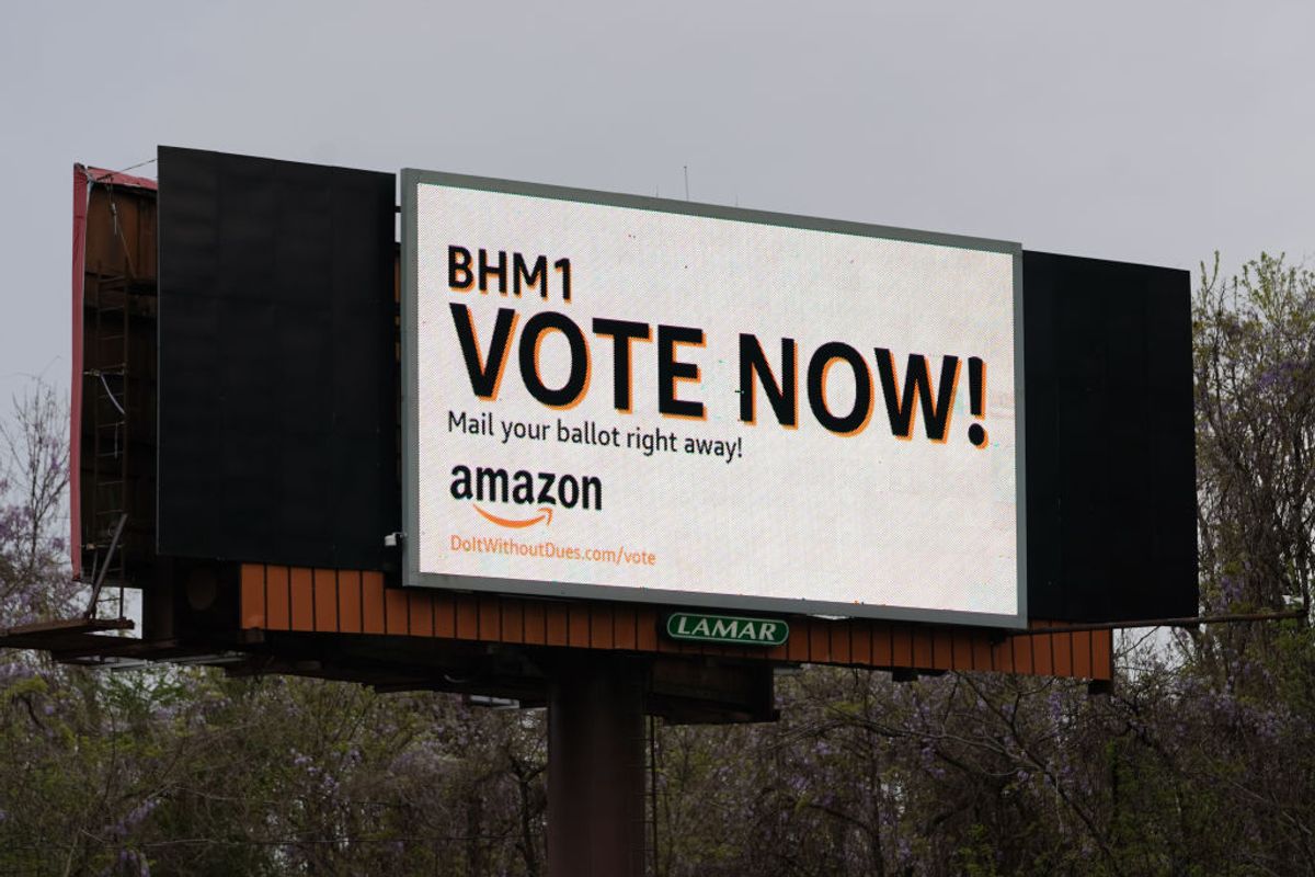 An Amazon-sponsored billboard urging employees to return their unionization ballots is seen on March 28, 2021, in Bessemer, Alabama. (Elijah Nouvelage/Getty Images)