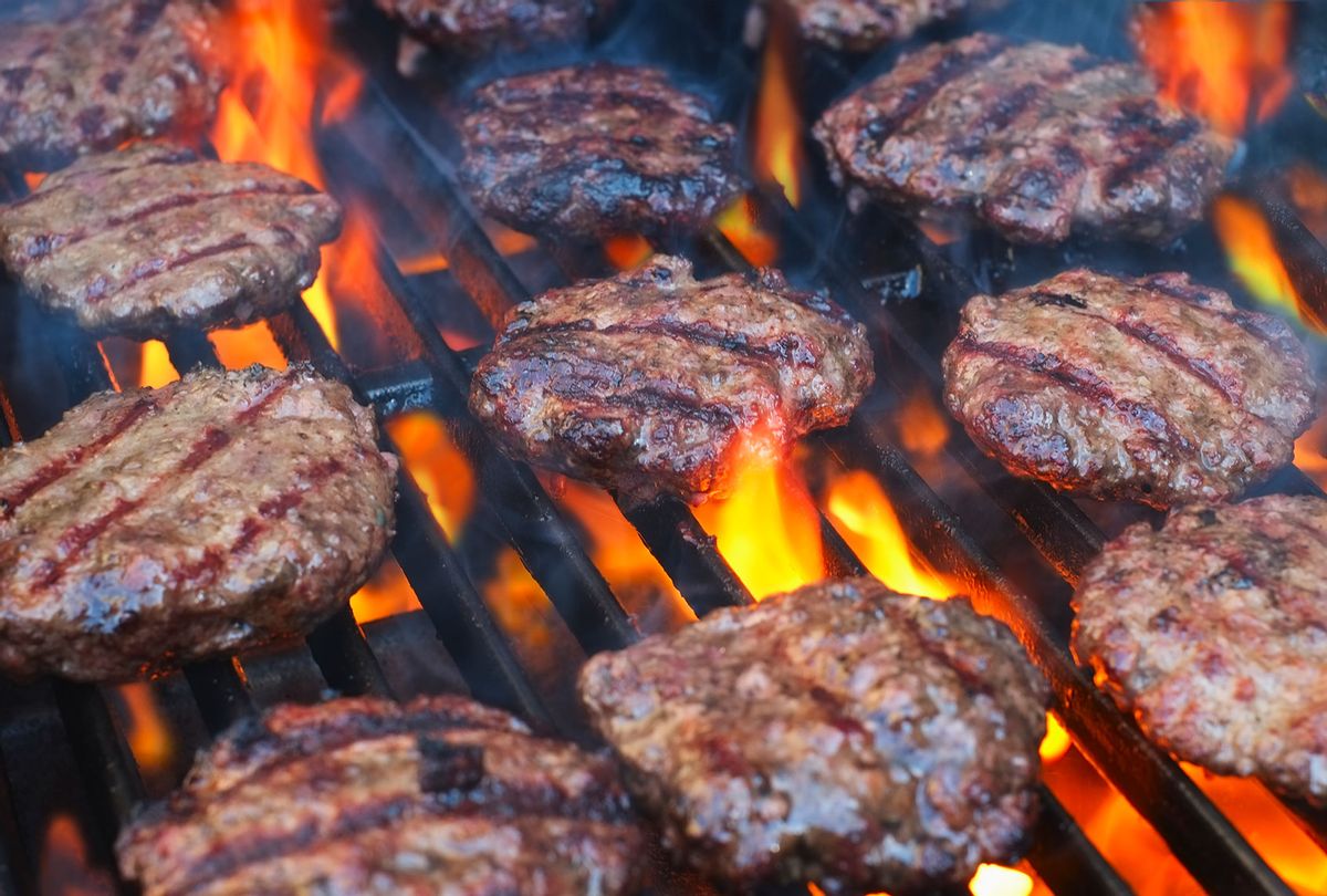 Burgers Cooking On A Grill (Getty Images)