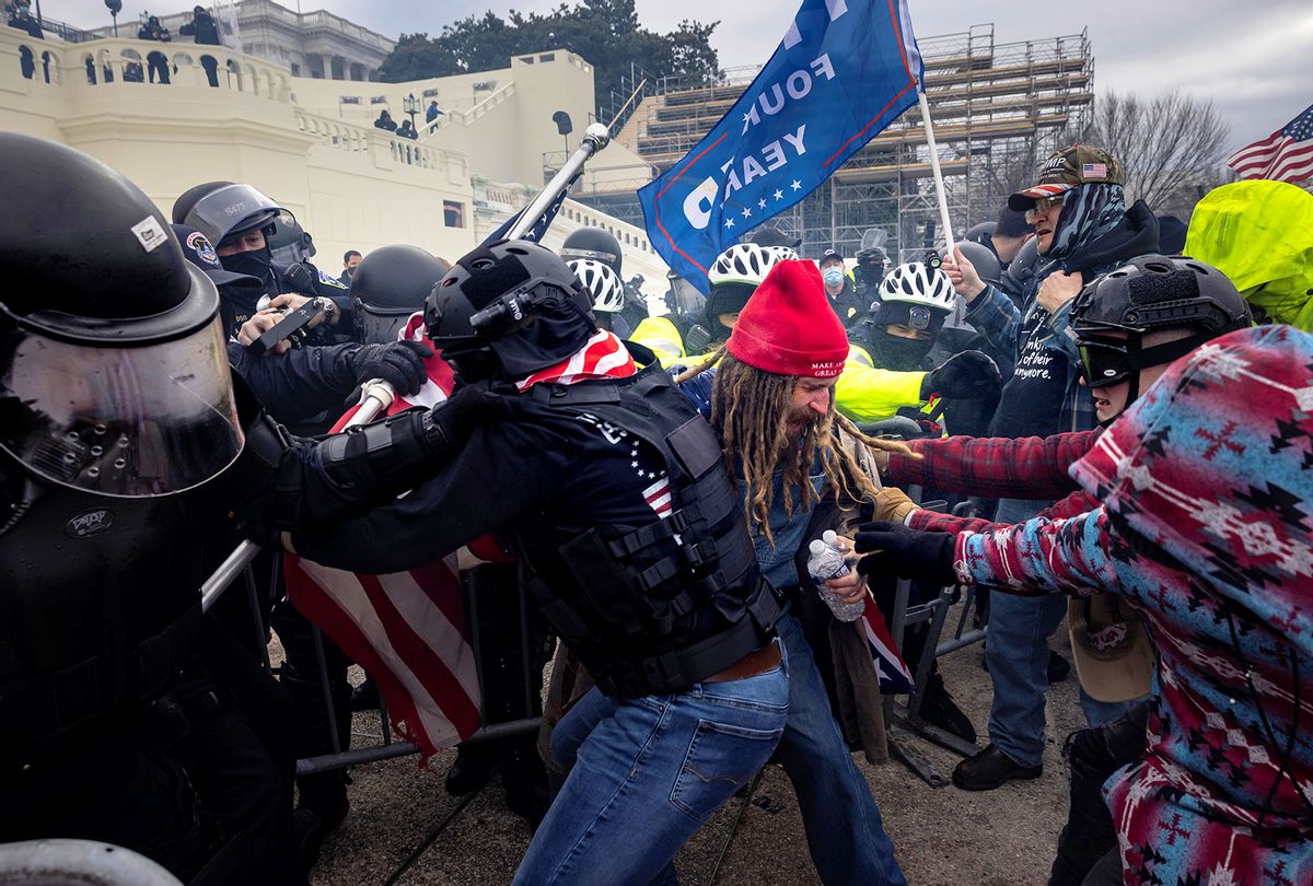 Trump supporters clash with police and security forces as people try to storm the US Capitol on January 6, 2021 in Washington, DC. Demonstrators breeched security and entered the Capitol as Congress debated the 2020 presidential election Electoral Vote Certification. (Brent Stirton/Getty Images)