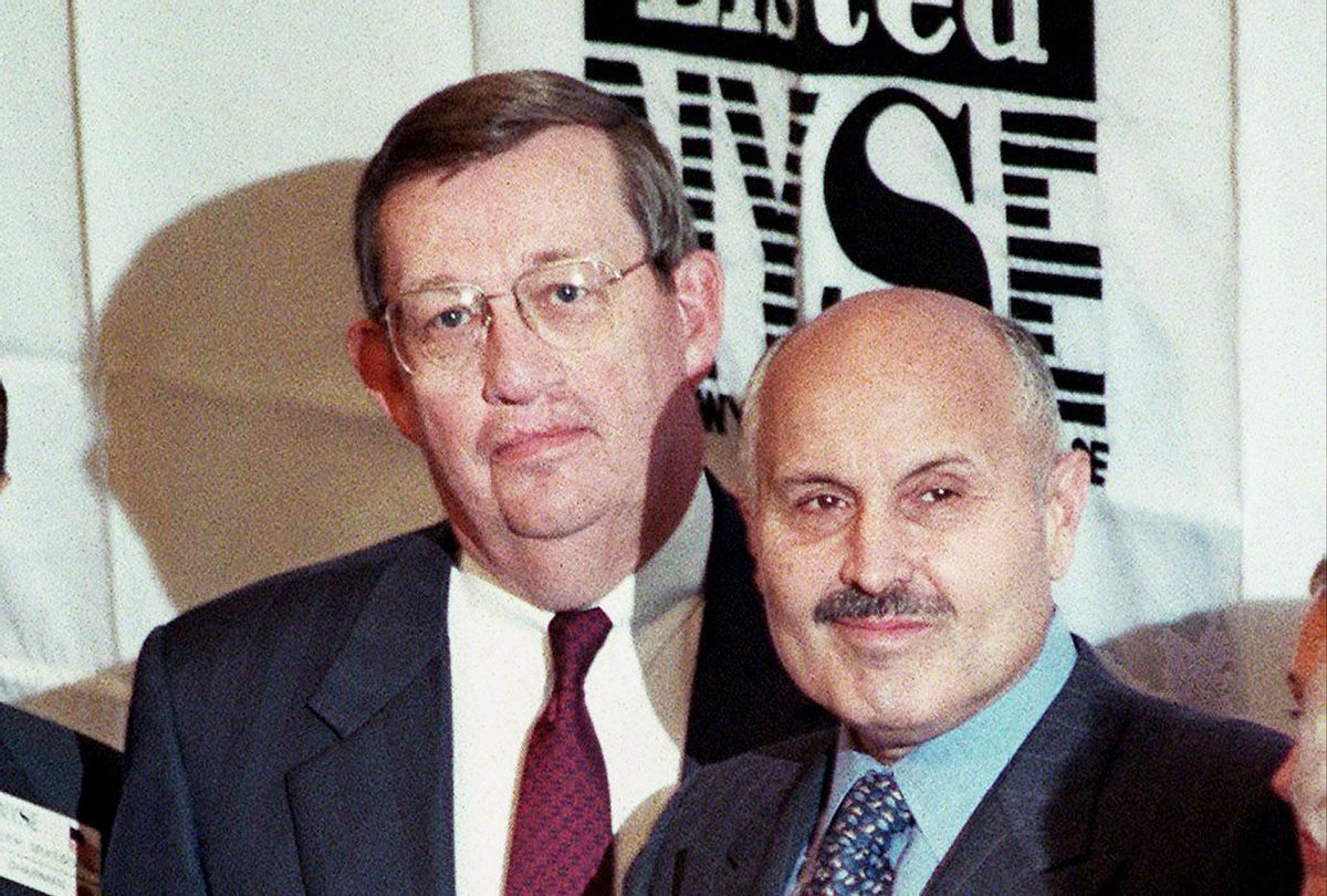 Exxon Corporation Chairman and Chief Executive Officer Lee Raymond (C) and Vice Chairman Lucio Noto, circa 01 December, 1999. (HENNY RAY ABRAMS/AFP via Getty Images)