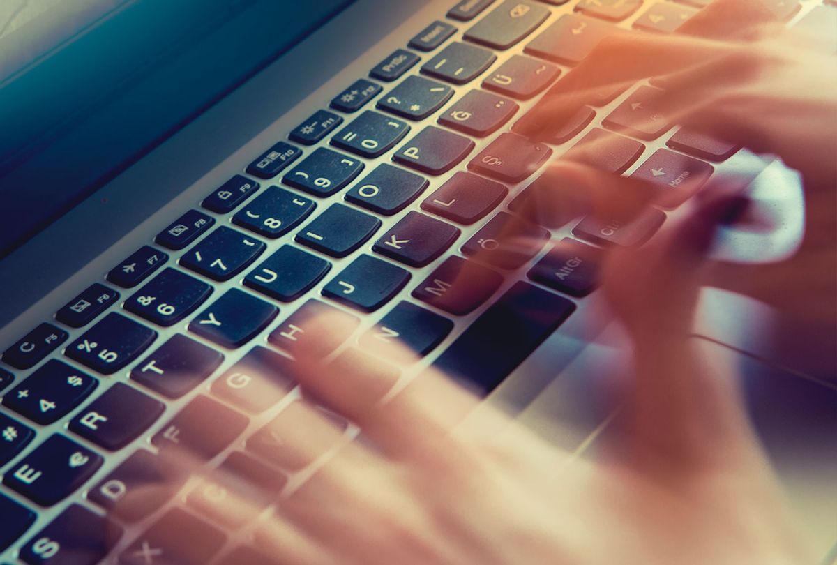 Typing on laptop (Getty Images)