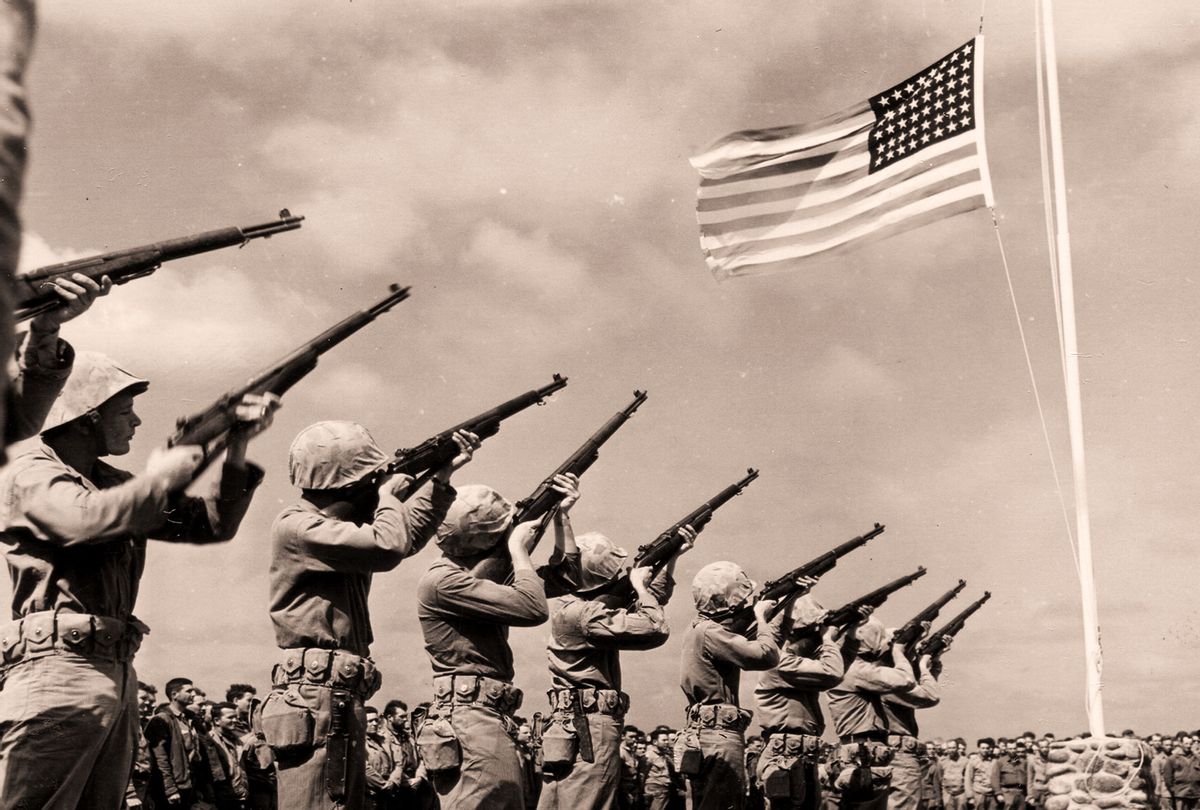 US Firing Squad salute the dedication of Fifth Marine Division Cemetery (PhotoQuest/Getty Images)