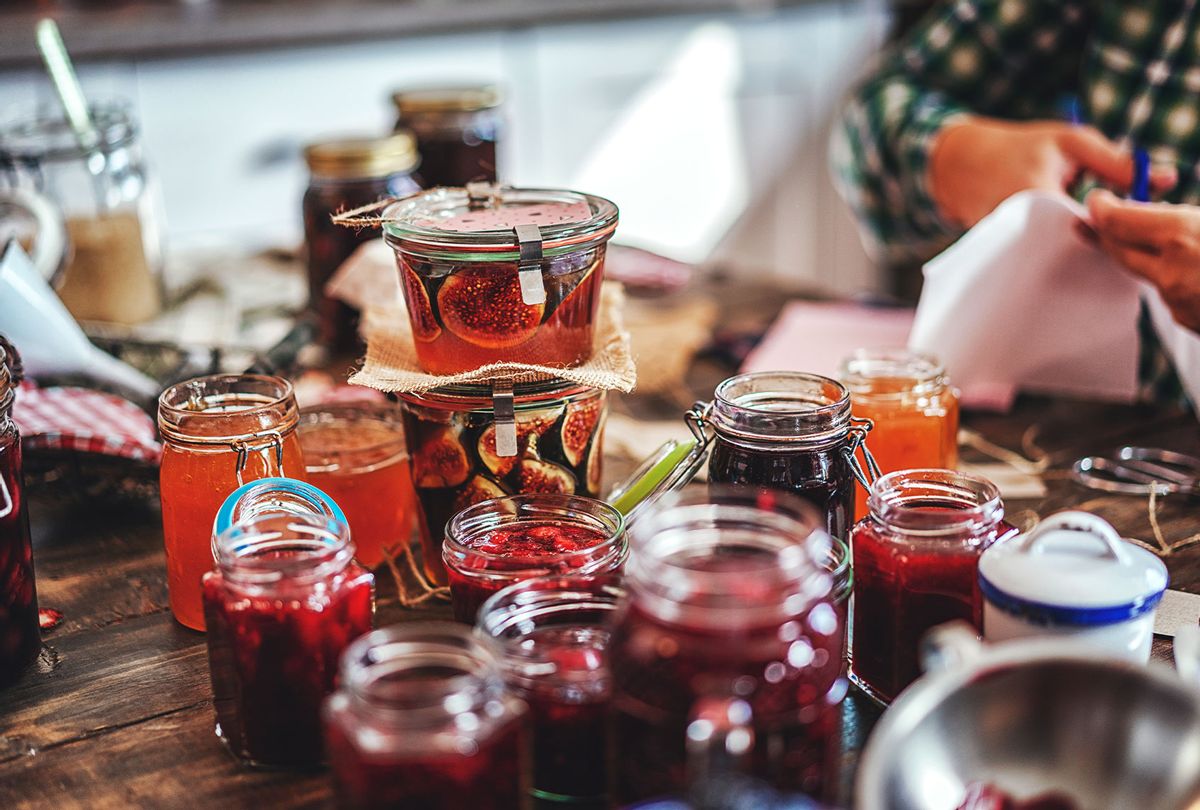 Preparing Homemade Strawberry, Blueberry and Raspberry Jam and Canning in Jars (Getty Images)