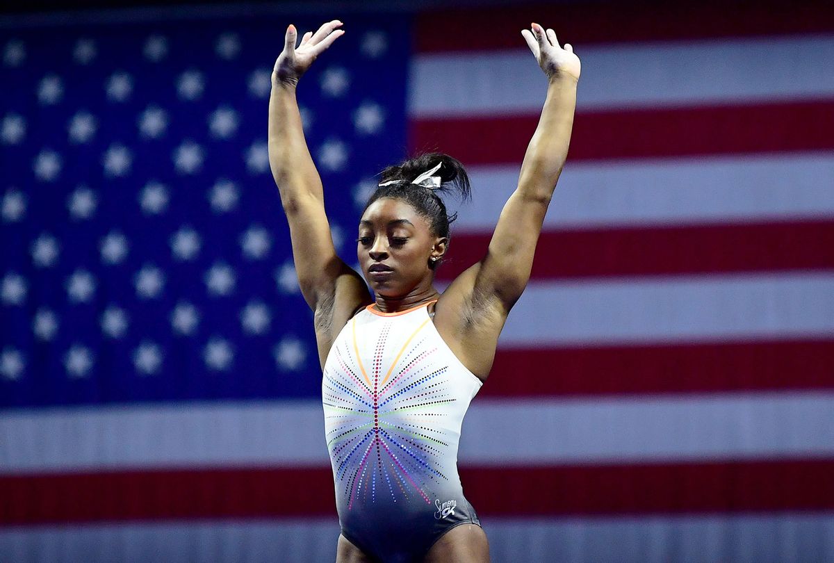 Simone Biles warms up on the beam prior to the 2021 GK U.S. Classic gymnastics competition at the Indiana Convention Center on May 22, 2021 in Indianapolis, Indiana. (Emilee Chinn/Getty Images)