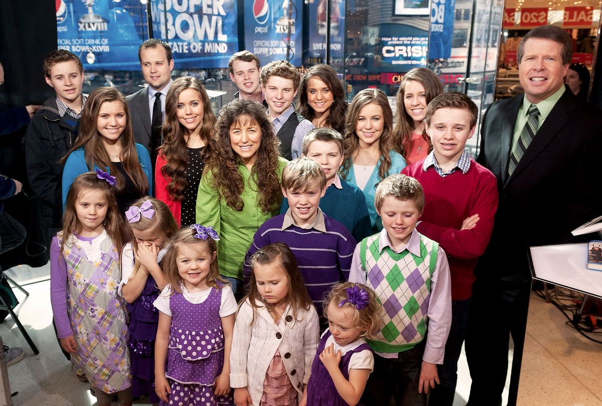 The Duggar family visits "Extra" at their New York studios at H&M in Times Square on March 11, 2014 in New York City. (D Dipasupil/Getty Images for Extra)