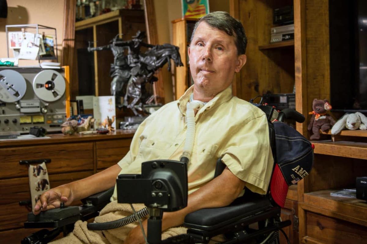 David Taylor, who has muscular dystrophy, relies on a ventilator to live. During the power outages across Texas in February, he had to be transported to a hospital before his ventilator’s backup battery ran out. (Rodger Mallison / Undark)