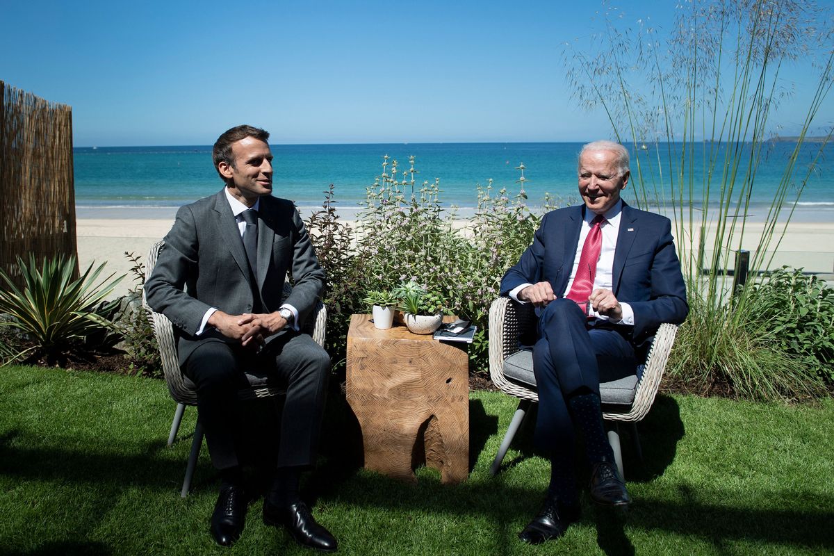 U.S. President Joe Biden and French President Emmanuel Macron speak at a G7 summit on June 12, 2021. (Getty Images)