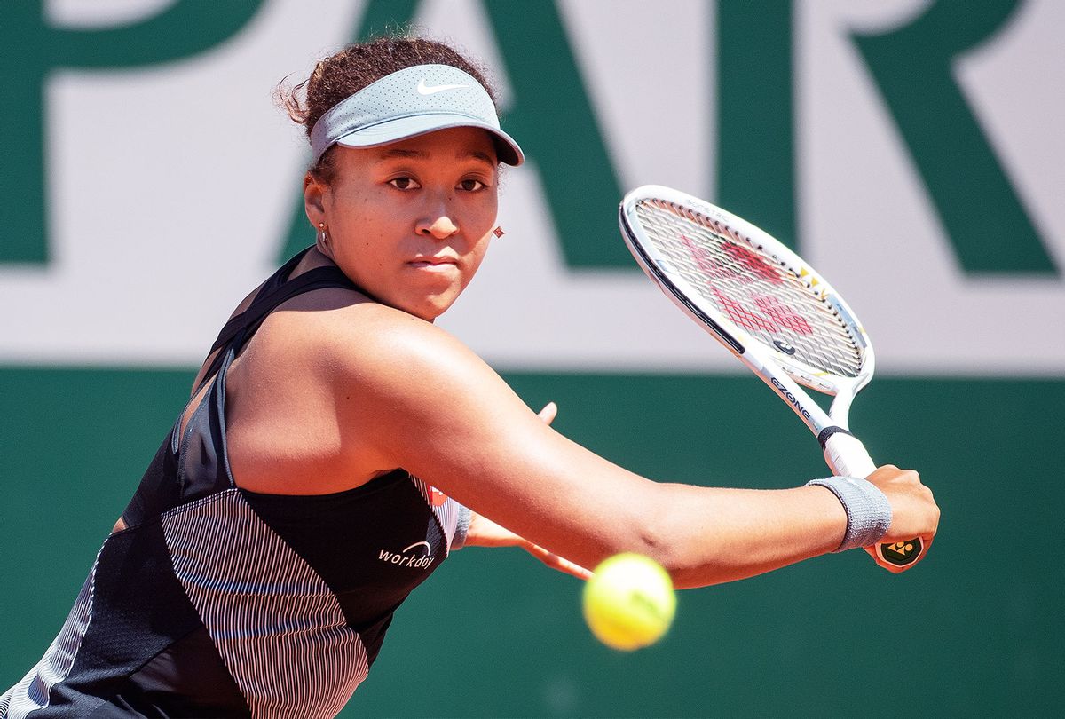 Naomi Osaka of Japan in action against Patricia Maria Tig of Romania in the first round of the Women's Singles competition on Court Philippe-Chatrier at the 2021 French Open Tennis Tournament at Roland Garros on May 30th 2021 in Paris, France. (Tim Clayton/Corbis via Getty Images)