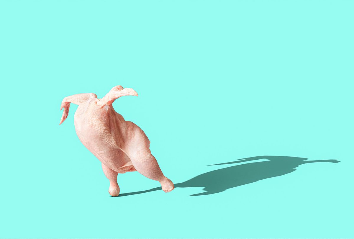 Whole raw chicken walking on a table (iStock/Getty Images)
