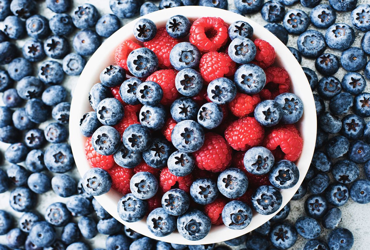 Bowl of blueberries and raspberries (Getty Images/Magdalena Niemczyk)
