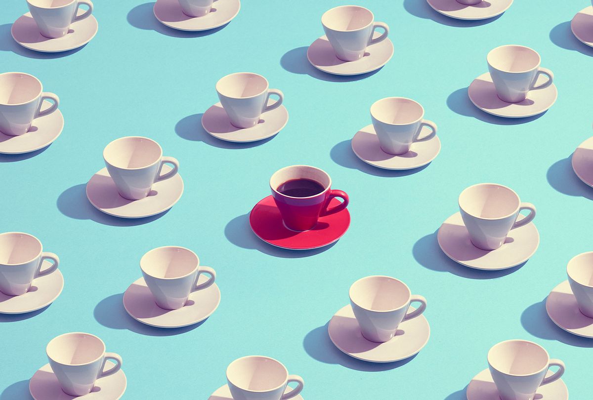 Large group of coffee cups placed in a pattern with one red cup standing out (Getty Images/Daniel Grizelj)