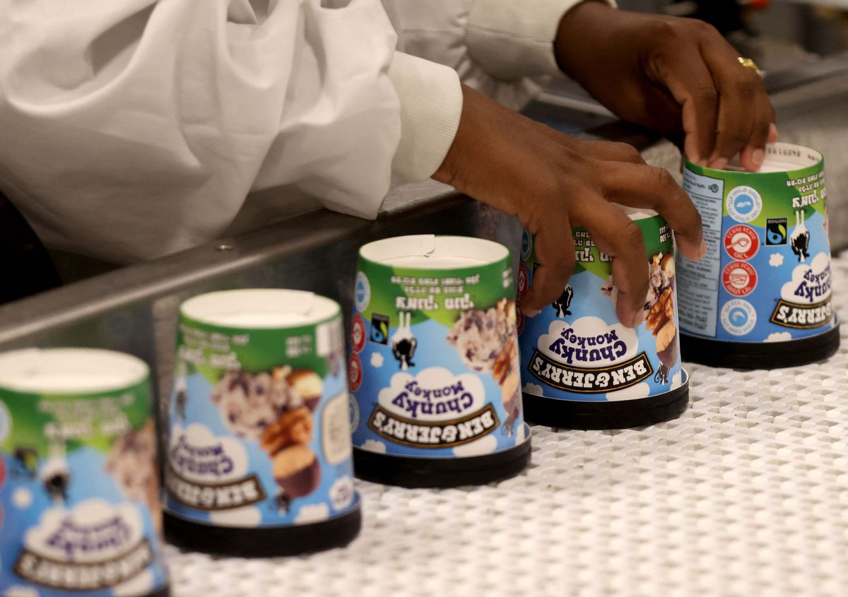 A labourer works on a production line filling ice-cream pots at the Ben & Jerry's factory in Be'er Tuvia in southern Israel, on July 21, 2021. (EMMANUEL DUNAND/AFP via Getty Images)