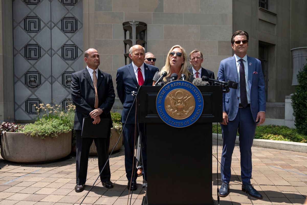 From left to right: Reps. Bob Good, Louie Gohmert, Andy Biggs, Marjorie Taylor Greene, Paul Gosar and Matt Gaetz hold a news conference outside the U.S. Department of Justice to demand answers from Attorney General Merrick Garland on the status of Jan. 6 prisoners.  (Getty Images)