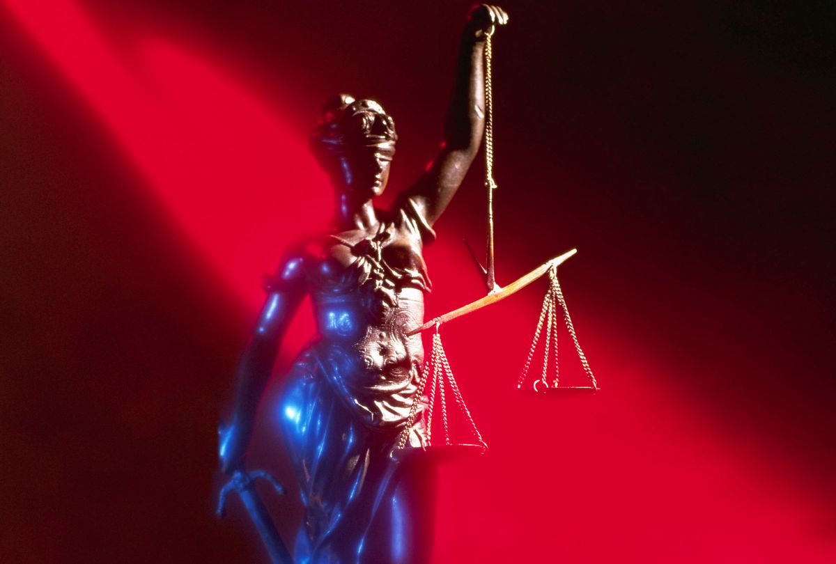 Lady Justice Holding Scales (Getty Images/Randy Faris)