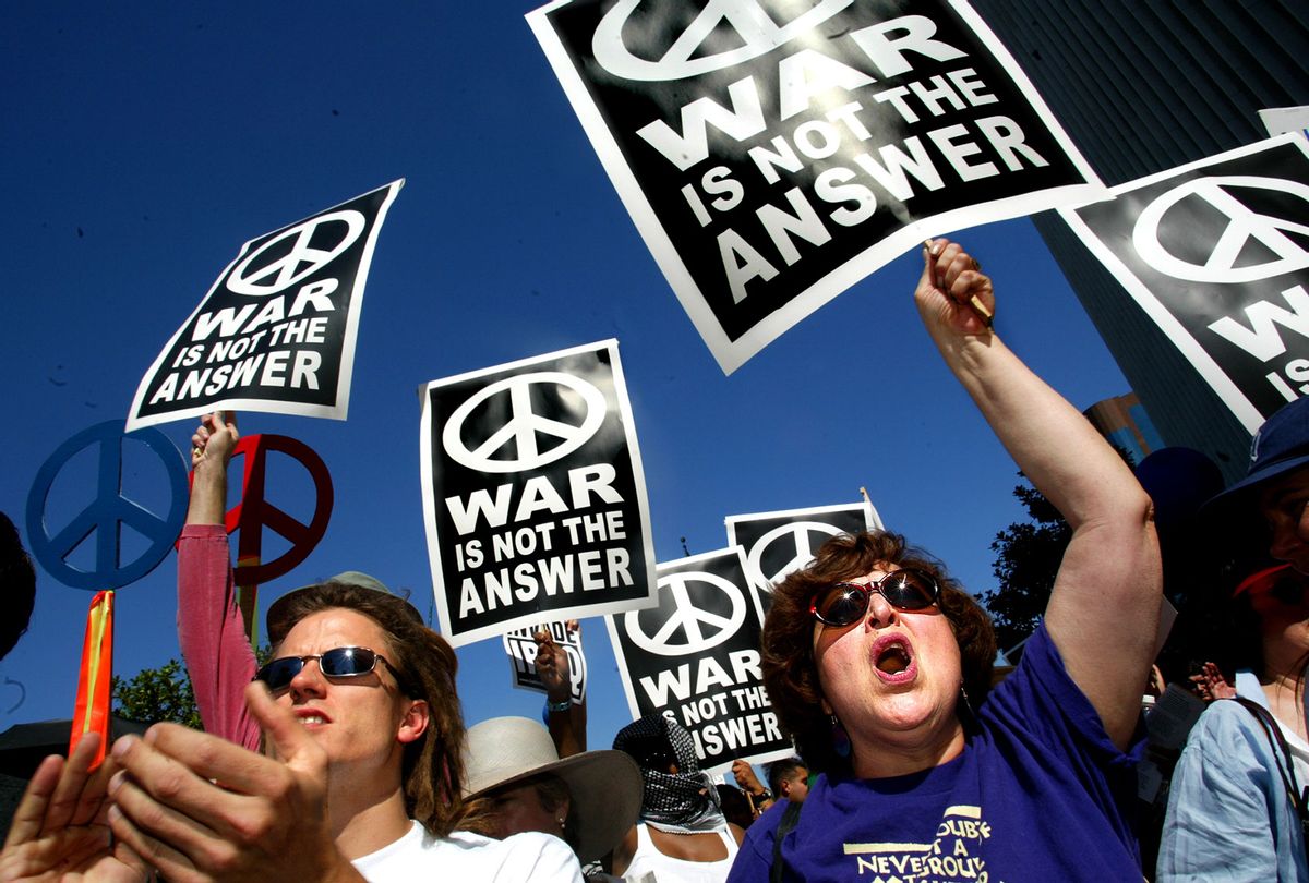Anti-war protest at the Federal Building in Westwood on Sunday, October 6, 2002. Over 4,000 people gathered to voice their oppositon to a war against Iraq. (Carolyn Cole/Los Angeles Times via Getty Images)