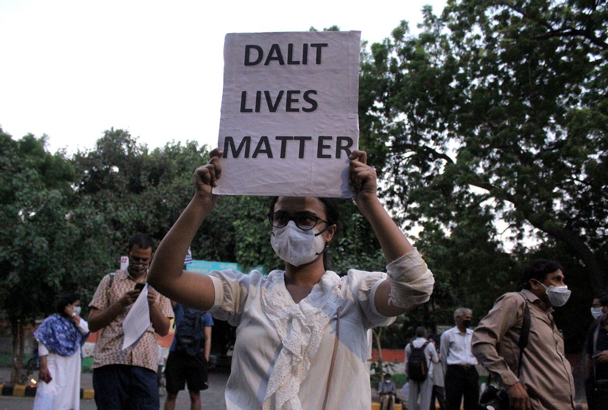 A student activist showing a placard stating 'Dalit Lives Matter' (Mayank Makhija/NurPhoto via Getty Images)