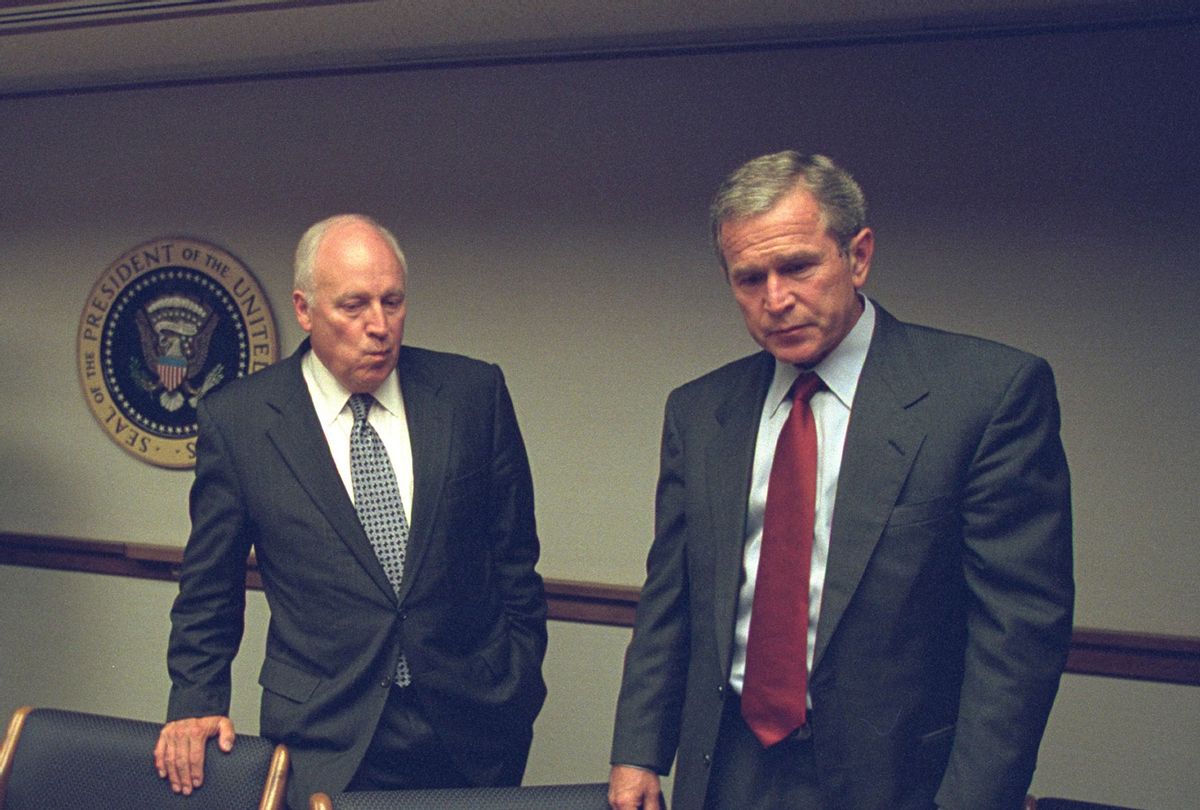 In this handout photo provided by the U.S. National Archives, Vice President Dick Cheney and President George W. Bush meet in the President's Emergency Operations Center (PEOC) after the terrorist attacks on September 11, 2001 in Washington, DC. (David Bohrer/U.S. National Archives via Getty Images)