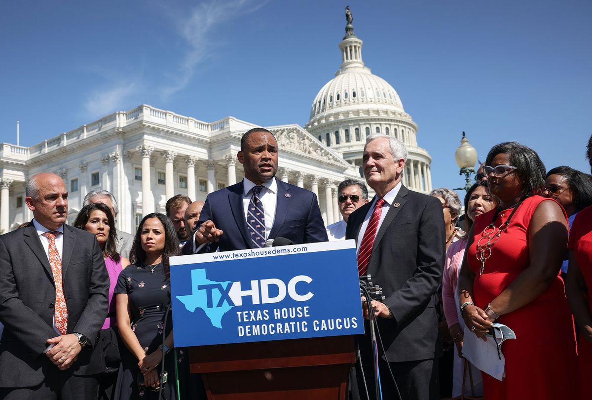 Congressmen Rep. Marc Veasey (D-TX) and Lloyd Dogget (D-TX) speak alongside Texas state House Democrats during a news conference on voting rights outside the U.S. Capitol on July 13, 2021 in Washington, DC. More than sixty Texas House Democrats left the state overnight to Washington, DC, in order to block a voting restrictions bill by denying a Republican quorum. Texas Governor Greg Abbott has threatened to arrest the legislators when they returns to the state. (Kevin Dietsch/Getty Images)