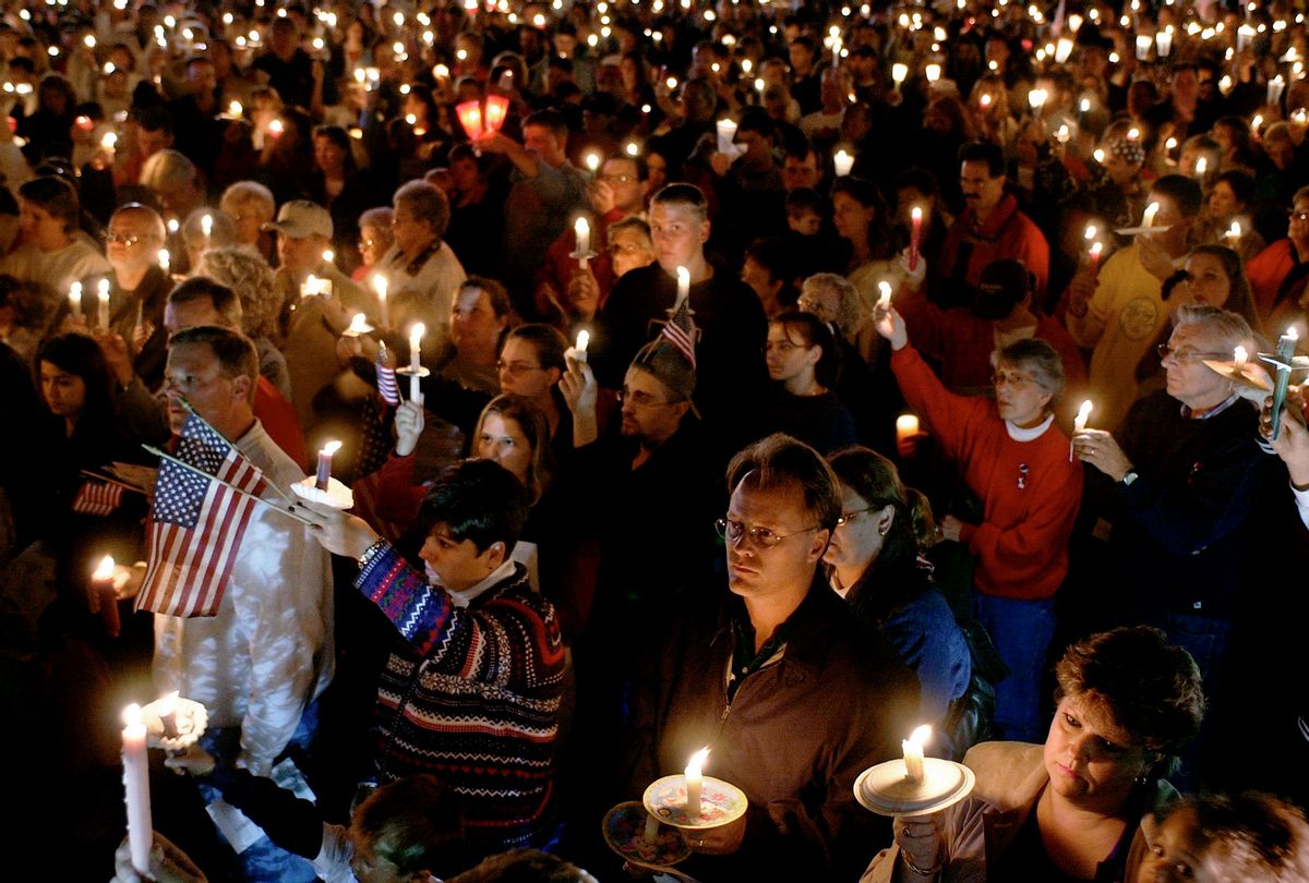 A candlelight vigil drawing over 1,000 people in the days after the devastating 9/11 terrorist attacks on New York City's World Trade Center & the Pentagon. (Steve Liss/Getty Images)