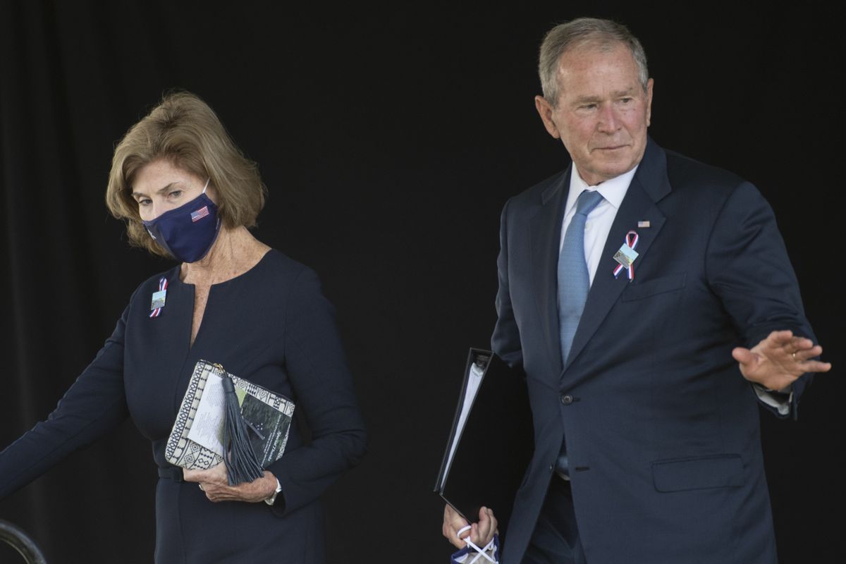 Former President George W. Bush and Barbara Bush walk off stage at the Flight 93 National Memorial commemorating the 20th anniversary of the crash of Flight 93 and the September 11th terrorist attacks, on Sept. 11, 2021. (Noah Riffe/Anadolu Agency via Getty Images)