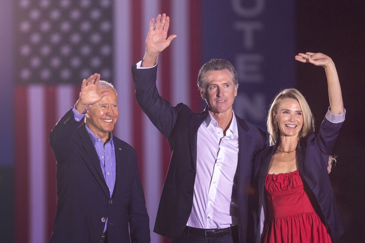 President Joe Biden, California Gov. Gavin Newsom and Jennifer Lynn Siebel Newsom wave to the crowd as they campaign to keep the governor in office at Long Beach City College on Sept. 13, 2021.  ( David McNew/Getty Images)