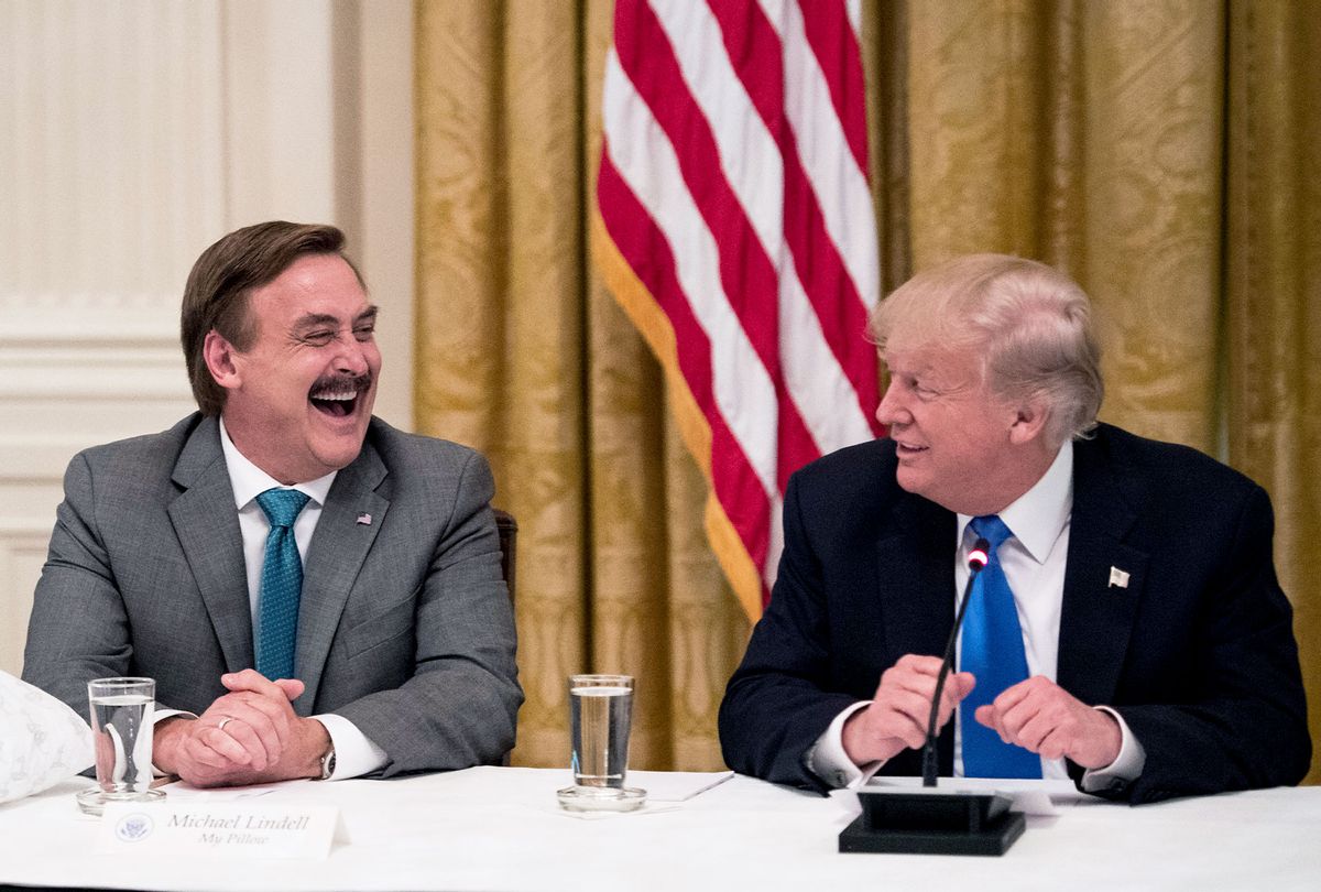 Michael Lindell, with My Pillow, laughs with President Donald Trump during a "Made in America," roundtable event in the East Room at the White House in Washington, DC on Wednesday, July 19, 2017. (Jabin Botsford/The Washington Post via Getty Images)