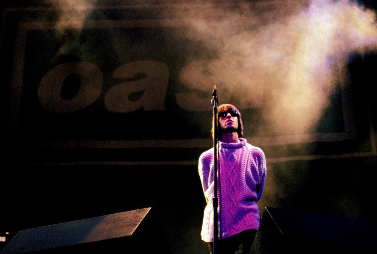 Liam Gallagher pictured on stage at Knebworth in 1996, when Oasis were at the height of their fame. (Roberta Parkin/Redferns/Permanent Press)