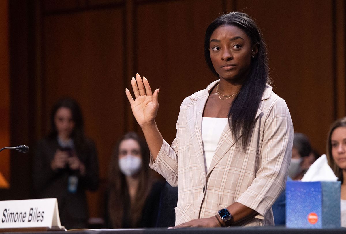 Simone Biles is sworn in to testify during a Senate Judiciary hearing about the FBI handling of the Larry Nassar investigation of sexual assault (SAUL LOEB/POOL/AFP via Getty Images)