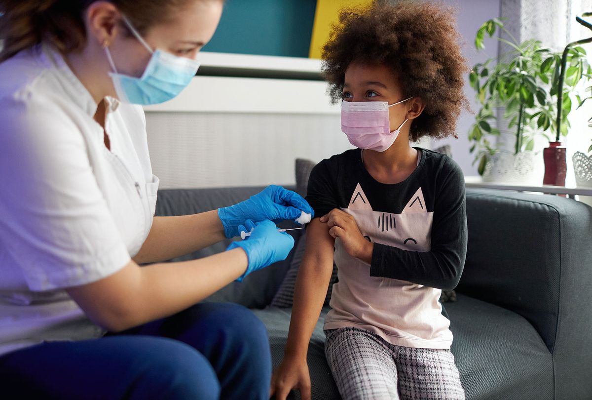 Child getting vaccinated (Getty Images/vgajic)