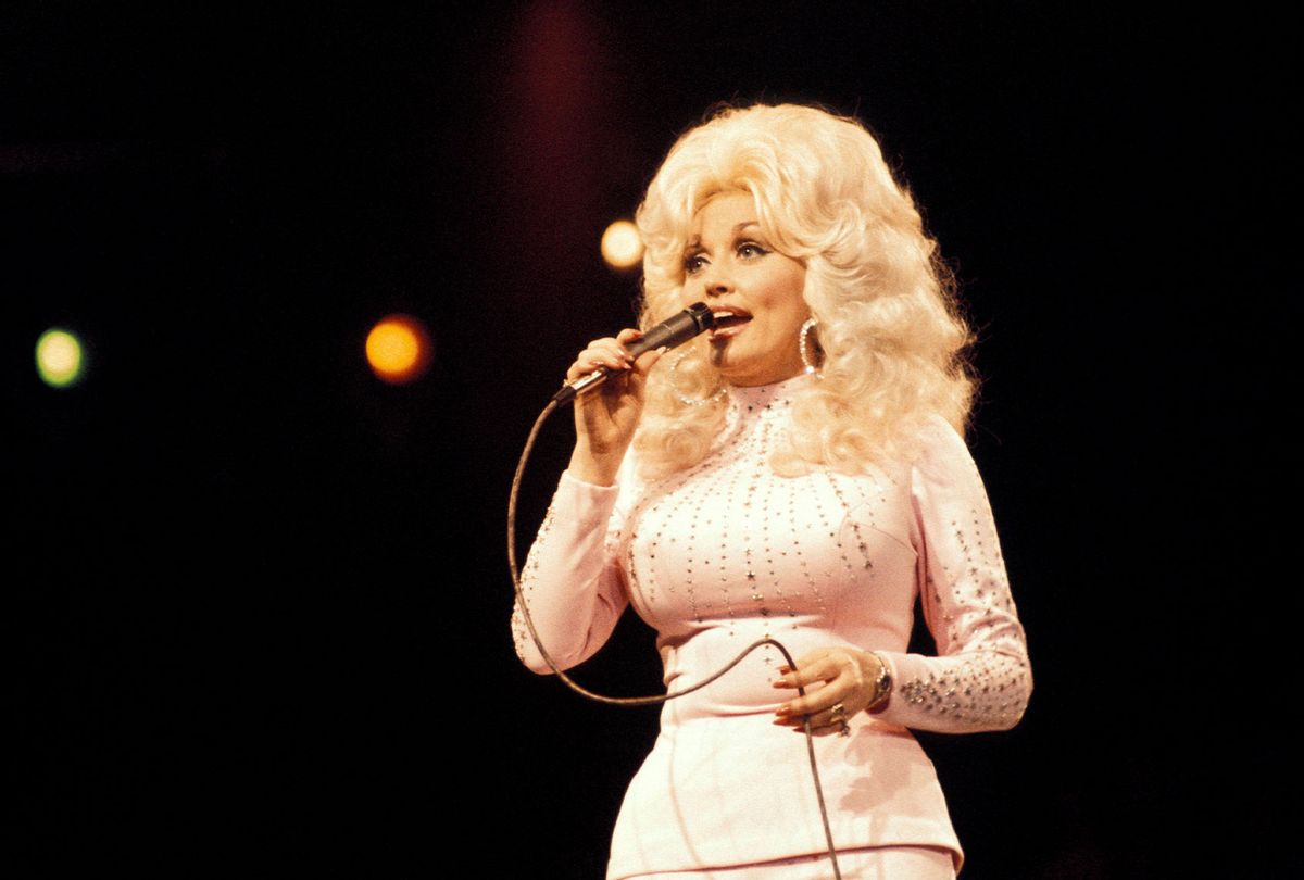 Dolly Parton performing live onstage at the UK Country Music Festival (Andrew Putler/Redferns/Getty Images)