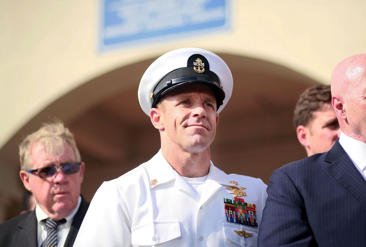 Navy Special Operations Chief Edward Gallagher celebrates after being acquitted of premeditated murder at Naval Base San Diego July 2, 2019 in San Diego, California. Gallagher was found not guilty in the killing of a wounded Islamic State captive in Iraq in 2017. He was cleared of all charges but one of posing for photos with the dead body of the captive. (Sandy Huffaker/Getty Images)