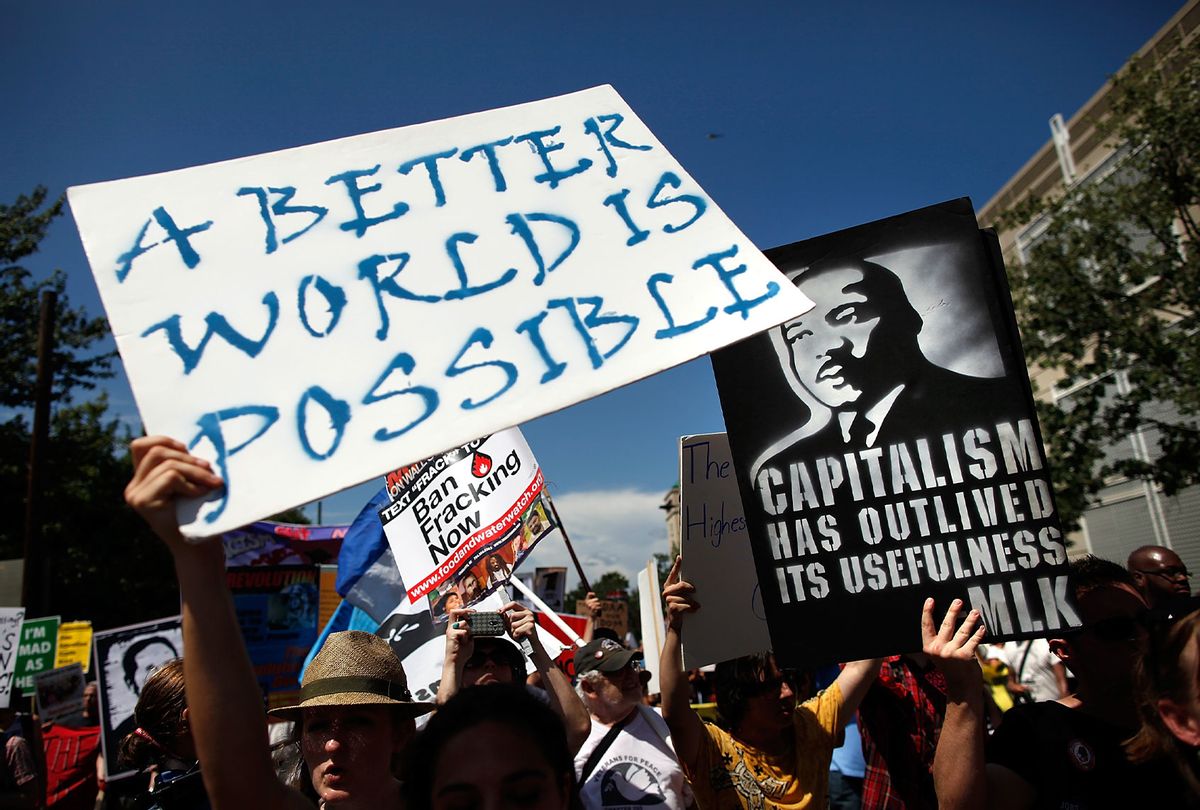 Protesters march through Uptown, the Charlotte the business district, before the start of the Democratic National Convention (DNC) September 2, 2012 in Charlotte, North Carolina. (Tom Pennington/Getty Images)