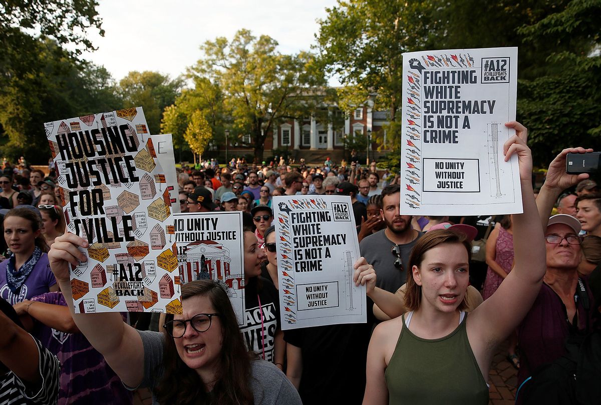 Protesters gather at an event on the campus of the University of Virginia organized by the group Students Act Against White Supremacy marking the one year anniversary of a deadly clash between white supremacists and counter protesters August 11, 2018 in Charlottesville, Virginia. (Win McNamee/Getty Images)