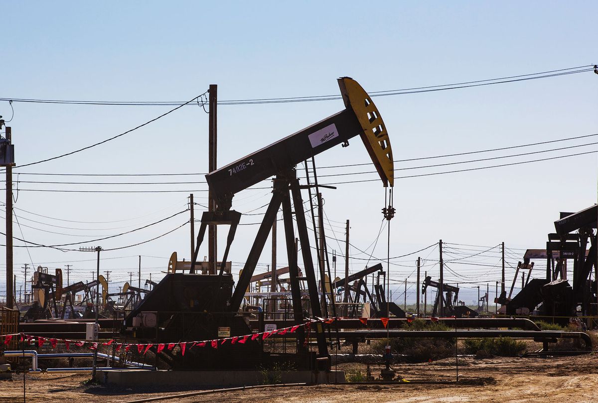 Oil pipelines, pumping rigs, and electrical transmission lines dot the landscape along California's "Petroleum Highway" (Highway 33) running along the northwestern side of the San Joaquin Valley on April 24, 2020, near McKittrick, California. (George Rose/Getty Images)