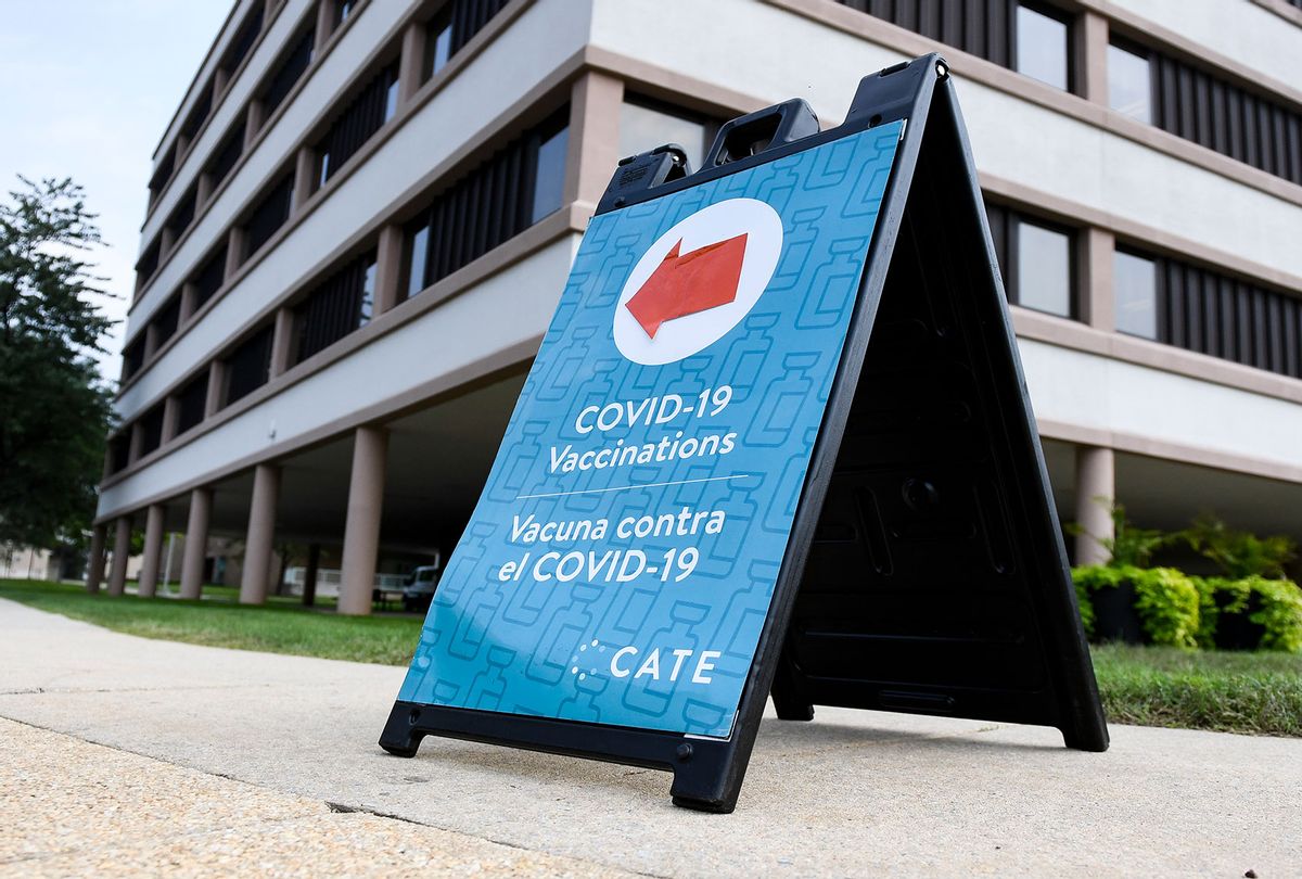 A sign on Front Street that reads "COVID-19 Vaccinations / Vacuna contra el COVID-19" at the Reading Area Community College campus in Reading, PA Tuesday morning September 14, 2021 (Ben Hasty/MediaNews Group/Reading Eagle via Getty Images)