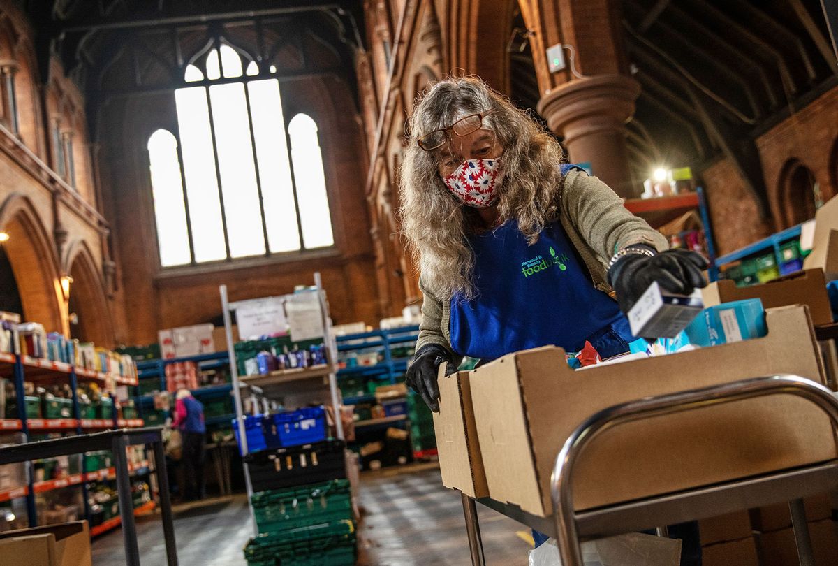 Staff and volunteers pack and prepare food parcels at the South London warehouse and distribution centre at St Margaret's Church on October 27, 2020 in London, England. (Dan Kitwood/Getty Images)
