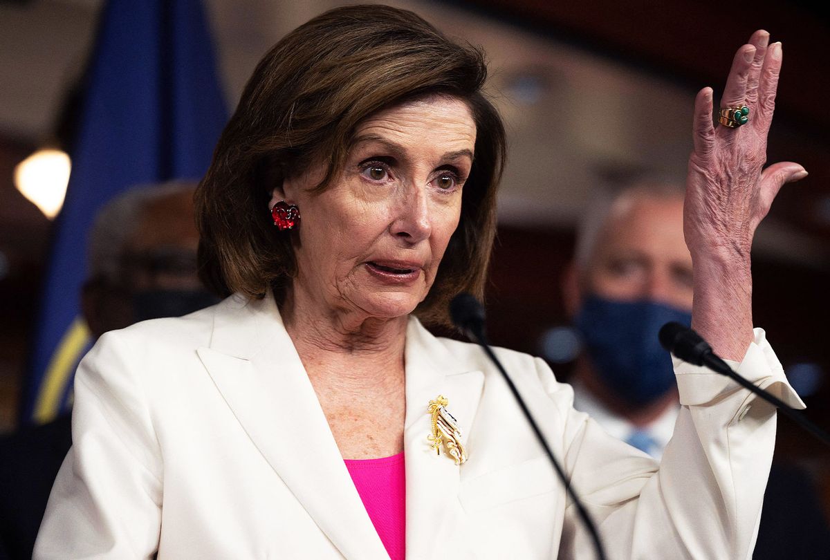 Speaker of the House Nancy Pelosi (C), D-CA, speaks during a news conference with Democratic leaders after the passage of the Build Back Better Act at the US Capitol in Washington, DC, on November 19, 2021. (JIM WATSON/AFP via Getty Images)