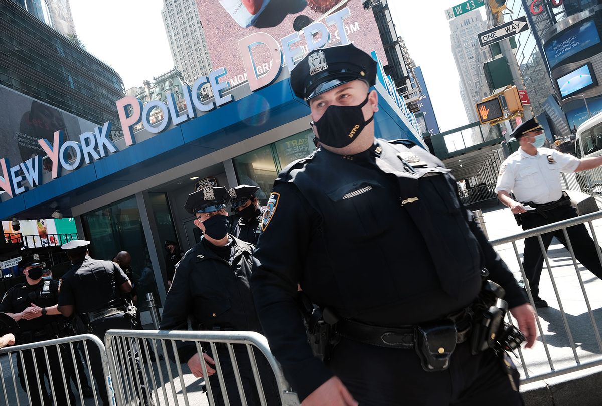 Members of the NYPD congregate in Times Square near a police precinct (Spencer Platt/Getty Images)