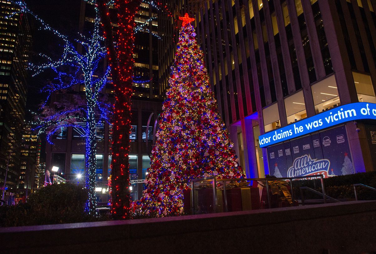 The new All-American Christmas Tree is lit outside News Corporation at Fox Square on December 9, 2021 in New York City, following an alleged arson fire. (Alexi Rosenfeld/Getty Images)
