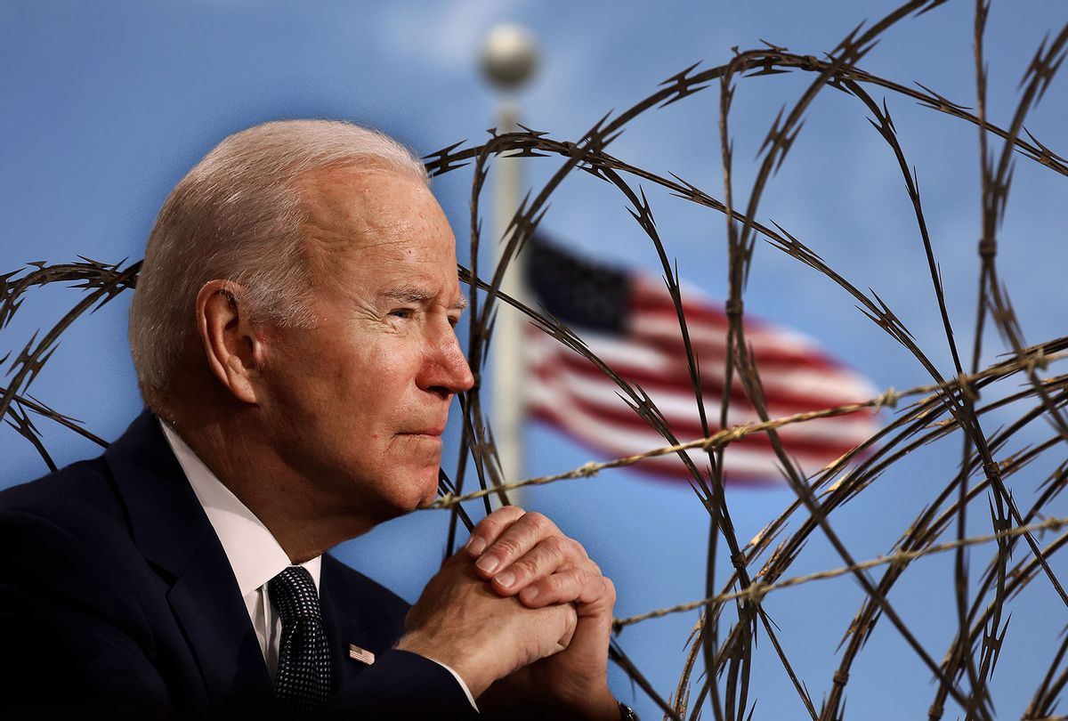 Joe Biden | Razor wire tops the fence of the U.S. prison at Guantanamo Bay (Photo illustration by Salon/Getty Images)
