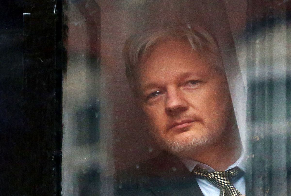 Wikileaks founder Julian Assange prepares to speak from the balcony of the Ecuadorian embassy where he continues to seek asylum following an extradition request from Sweden in 2012, on February 5, 2016 in London, England. (Carl Court/Getty Images)